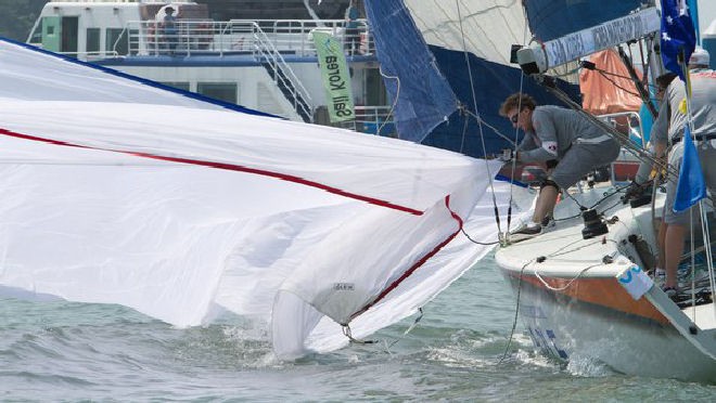 Peter Gilmour drops his gennaker as he executes a penalty turn - 11th June, qualifier 4 - Korea Match Cup 2011 © Subzero Images /AWMRT http://wmrt.com